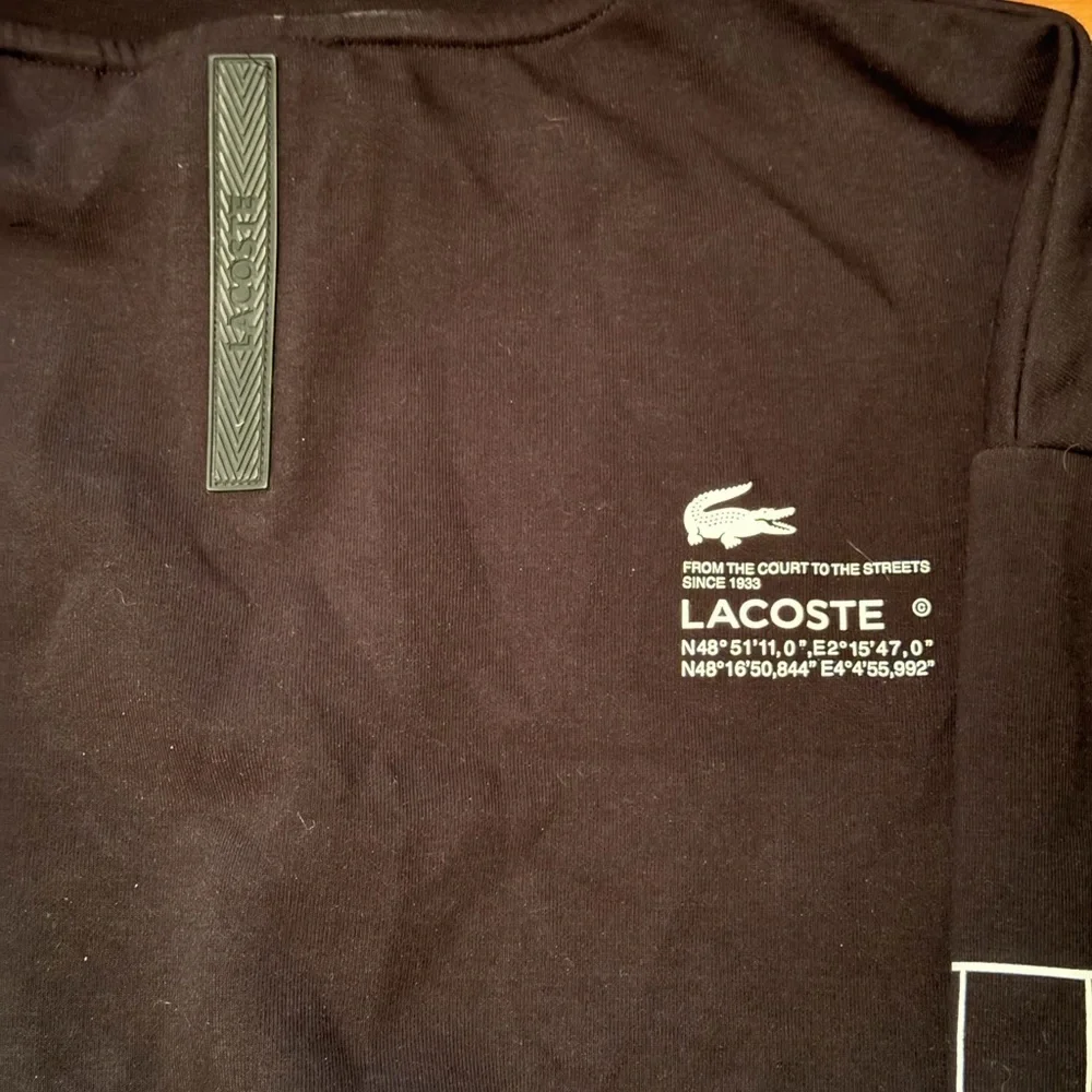 LACOSTE LOOSE FIT TWO-PLY PIQUE SWEATSHIRT (BLACK) Small